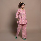 Right View of a Model wearing Fuchsia Floral Block Print Cotton Straight Pant