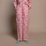 Front View of a Model wearing Fuchsia Floral Block Print Cotton Straight Pant