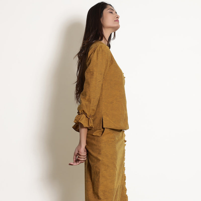 Right View of a Model wearing Golden Oak Warm Cotton Frilled Sleeve Top