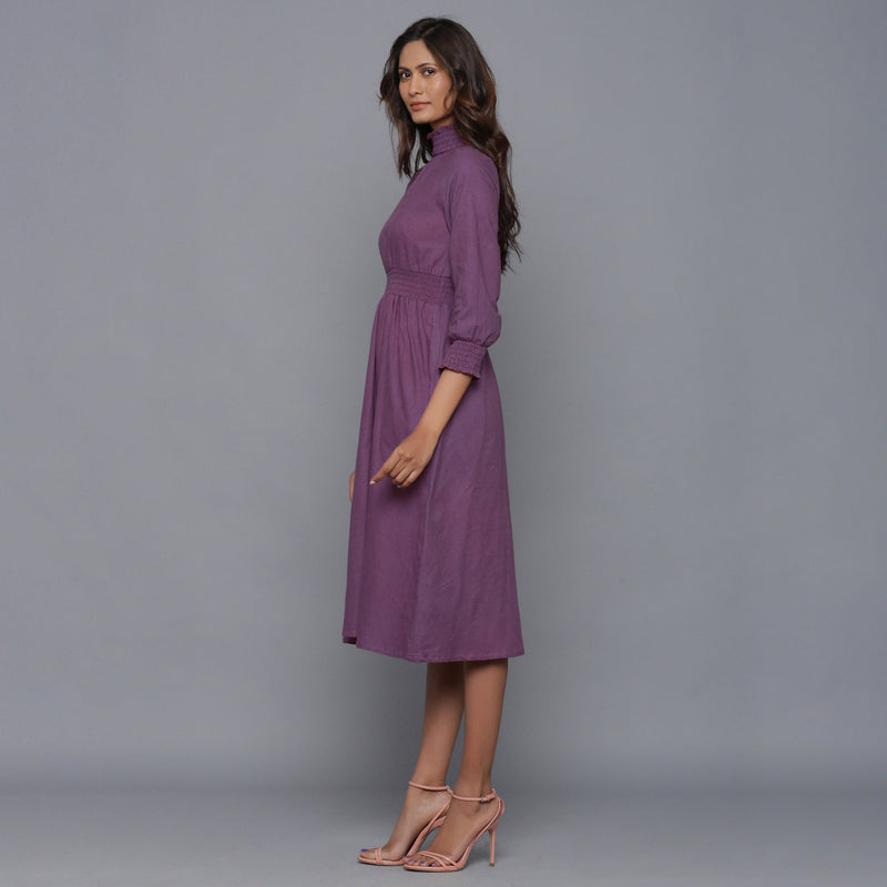 Left View of a Model wearing Grape Wine Flannel High Neck Midi Dress