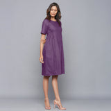Right View of a Model wearing Grape Wine Paneled Cotton Flannel Dress