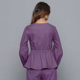 Back View of a Model wearing Grape Wine V-Neck Flannel Peplum Top