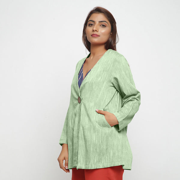 Left View of a Model wearing Green 100% Cotton Flared Short Jacket