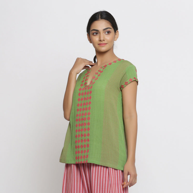 Left View of a Model wearing Green And Red Yarn Dyed A-Line Top