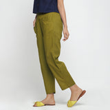 Left View of a Model wearing Green Ankle Length Mid-Rise Chinos
