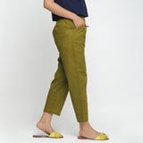 Right View of a Model wearing Green Ankle Length Mid-Rise Chinos