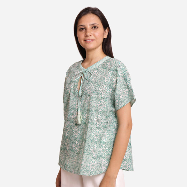 Left View of a Model wearing Sanganeri Block Print Floral Tunic Top