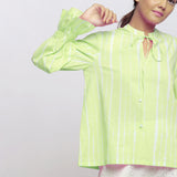 Front Detail of a Model wearing Green Hand Tie Dyed Shirred Blouson Top
