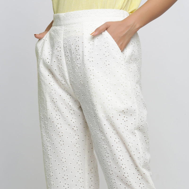 Left Detail of a Model wearing Cotton Schiffli White Straight Pant