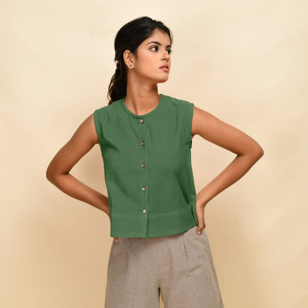 Front View of a Model wearing Green Corduroy Button-Down Short Top