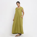 Front View of a Model wearing Green Cotton Flax A-Line Paneled Dress