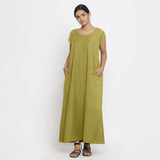 Front View of a Model wearing Green Cotton Flax A-Line Paneled Dress