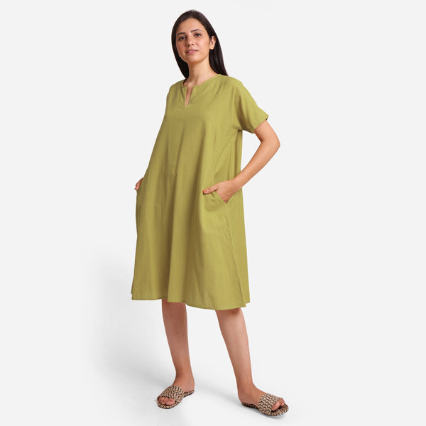 Left View of a Model wearing Green Cotton Flax Anti-Fit Dress