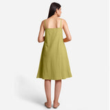 Back View of a Model wearing Green Cotton Flax Strappy Slit Dress