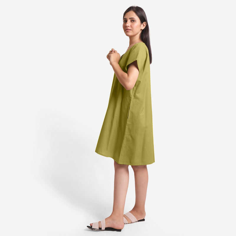 Left View of a Model wearing Green Cotton Flax V-Neck Tunic