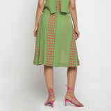 Back View of a Model wearing Green Crinkled Cotton Geometric Knee Length Skirt
