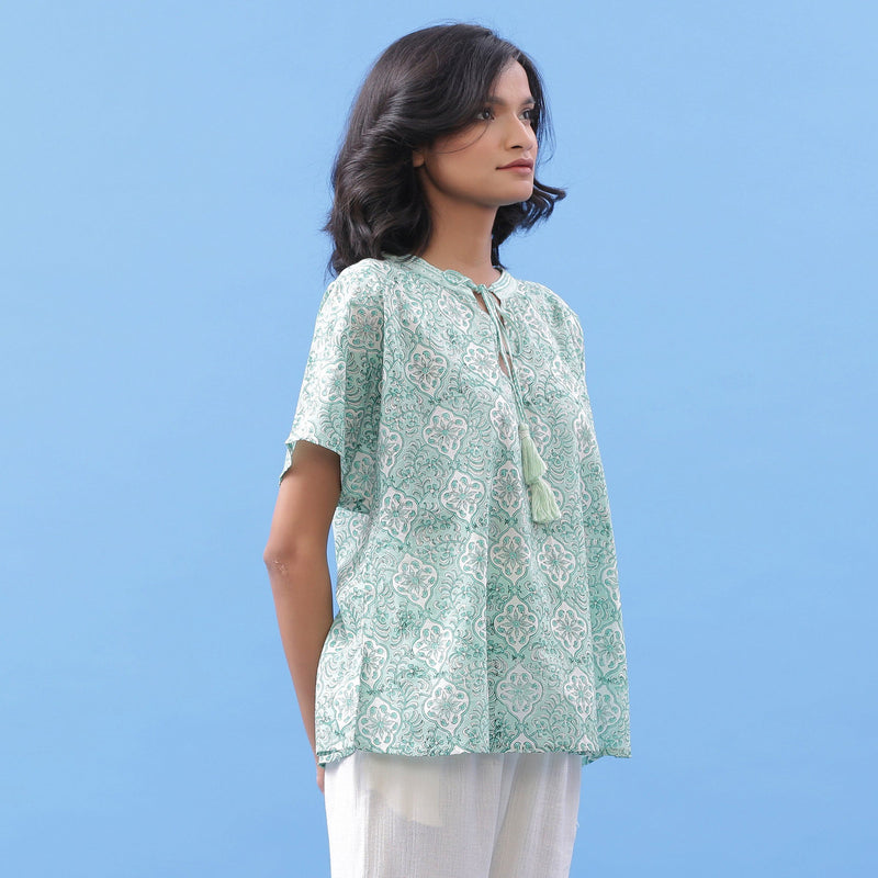 Right View of a Model wearing Green Hand Block Printed A-Line Cotton Top
