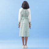Back View of a Model wearing Green Hand Block Printed Peasant Dress