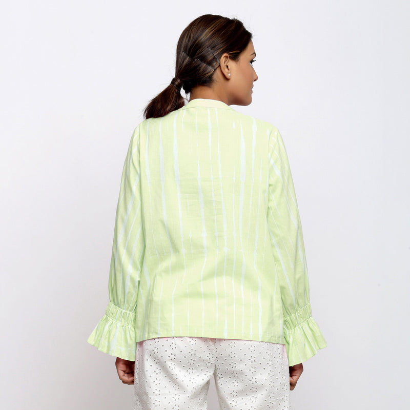 Back View of a Model wearing Green Hand Tie Dyed Shirred Blouson Top