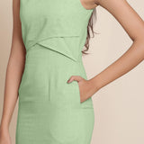 Front Detail of a Model wearing Green Knee Length Cotton Sheath Dress