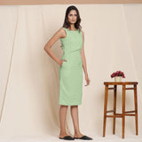 Right View of a Model wearing Green Knee Length Cotton Sheath Dress
