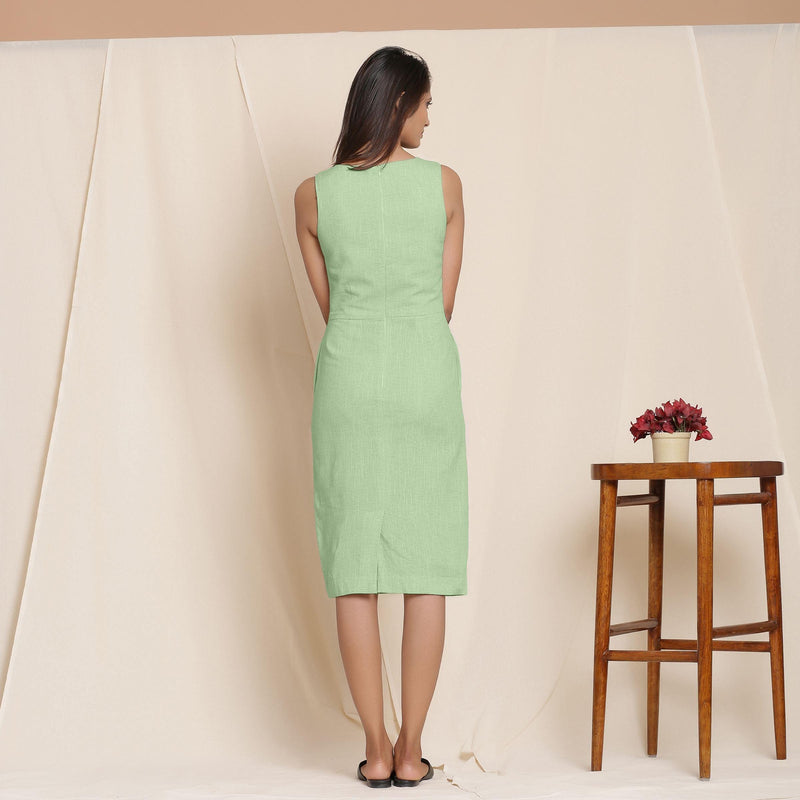 Back View of a Model wearing Green Knee Length Cotton Sheath Dress