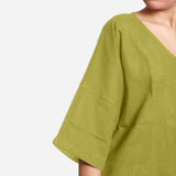 Right Detail of a Model wearing Green Loose Fit Drop Shoulder Top
