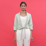 Front View of a Model wearing Green Reversible Quilted Cotton Shrug