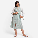 Front View of a Model wearing Green Block Print Cotton Peasant Midi Dress