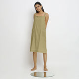 Front View of a Model wearing Green Vegetable Dyed Handspun Slip Dress