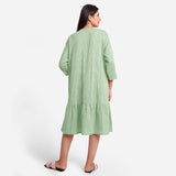 Back View of a Model wearing Green Yarn-Dyed 100% Cotton Tier Midi Dress