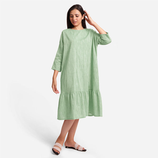 Front View of a Model wearing Green Yarn-Dyed 100% Cotton Tier Midi Dress