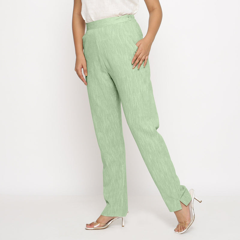 Left View of a Model wearing Green Yarn Dyed Mid Rise Tapered Pant