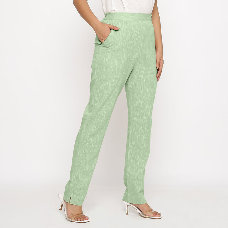 Right View of a Model wearing Green Yarn Dyed Mid Rise Tapered Pant