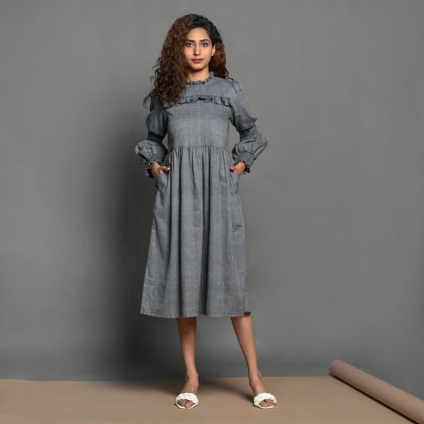 Front View of a Model wearing Slate Grey Handspun Cotton Knee Length Frilled Peasant Dress