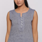 Front Detail of a Model wearing Grey Split Neck Button Down Top