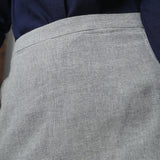 Back Detail of a Model wearing Grey Yarn Dyed Cotton Straight Skirt