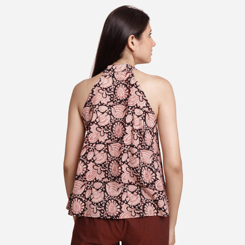 Back View of a Model wearing Halter Neck Floral Button-Down Top