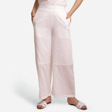 Front View of a Model wearing Off-White Hand Beaded Cotton Elasticated Wide Legged Pant