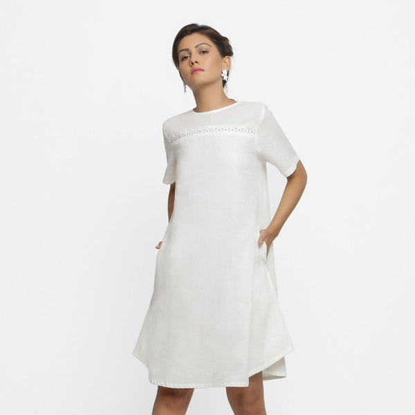 Front View of a Model wearing White Hand Beaded Cotton A-Line Dress
