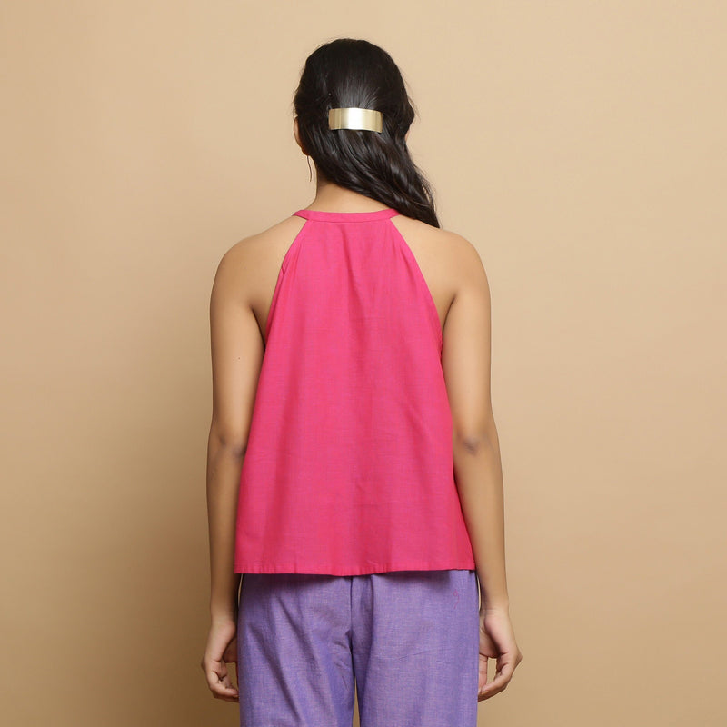 Back View of a Model wearing Magenta Hand Embroidered Flared Top