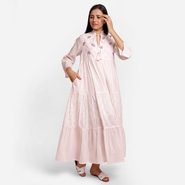 Right View of a Model wearing Powder Pink Cotton Block Print Maxi Peasant Dress