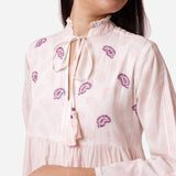 Front Detail of a Model wearing Powder Pink Cotton Block Print Maxi Peasant Dress