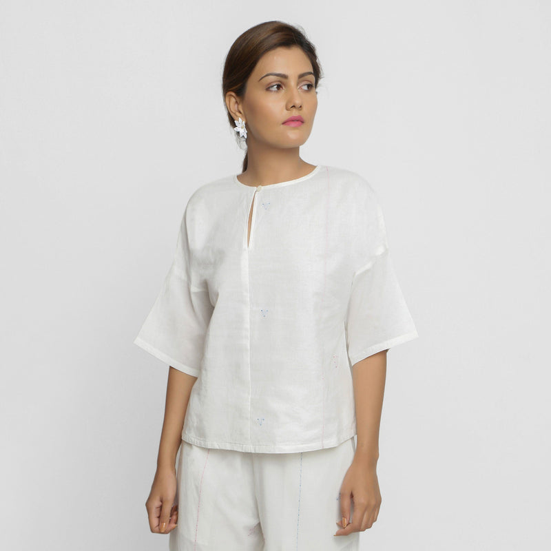 Front View of a Model wearing Hand Embroidered Organic Cotton Paneled Top