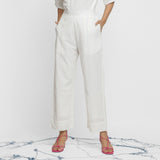 Front View of a Model wearing Off-White Banded Hem Straight Pant