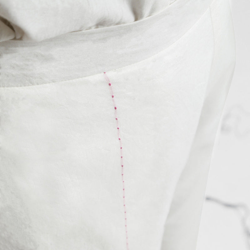 Front Detail of a Model wearing Off-White Banded Hem Straight Pant