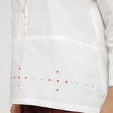 Close View of a Model wearing Hand beaded Cotton Poplin Button-Down Top