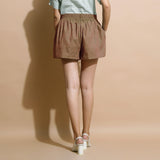 Back View of a Model wearing Handspun Brown Flared Shorts