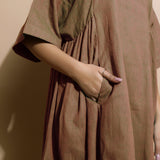 Front Detail of a Model wearing Handspun Brown Paneled Loose Fit Dress