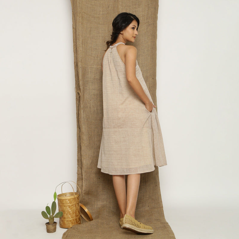 Back View of a Model wearing Handspun Cotton Lace Paneled Dress